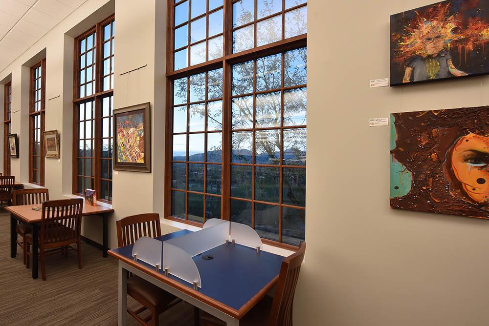 library reading nook with art